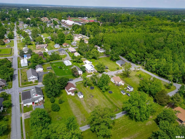 1408 Newton Ave, Johnston City, IL 62951 - aerial overview of property's location featuring a heavily wooded area and nearby suburban area