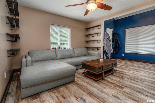 611 E Grand Ave, Carterville, IL 62918 - living room featuring ceiling fan, wood finished floors, and baseboards