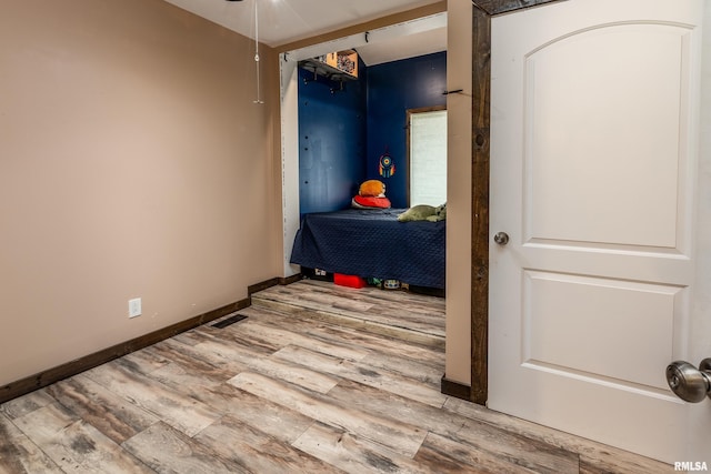 611 E Grand Ave, Carterville, IL 62918 - bedroom with wood finished floors and baseboards