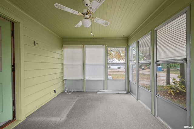 519 2nd St, Camanche, IA 52730 - unfurnished sunroom featuring ceiling fan