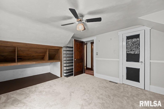 2446 16th Ave, Moline, IL 61265 - bonus room featuring carpet flooring, vaulted ceiling, and a ceiling fan