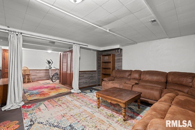 2446 16th Ave, Moline, IL 61265 - living room featuring wood walls and a wainscoted wall