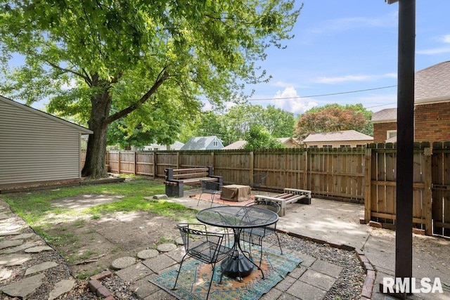 2446 16th Ave, Moline, IL 61265 - fenced backyard with a patio area