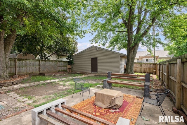 2446 16th Ave, Moline, IL 61265 - fenced backyard with an outbuilding