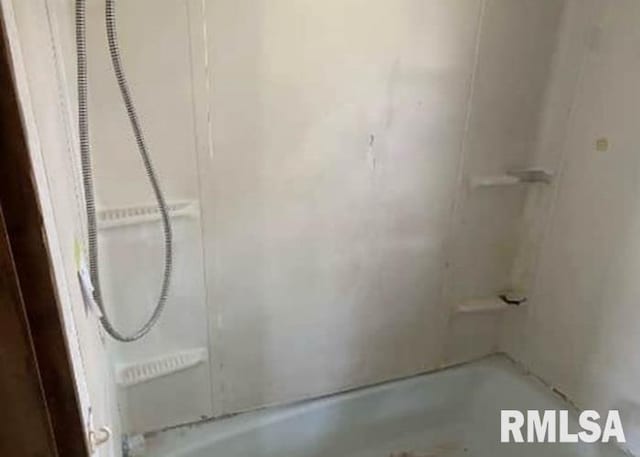 207 W Wilson St, New London, IA 52645 - full bath featuring bathing tub / shower combination