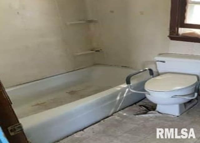 207 W Wilson St, New London, IA 52645 - bathroom with toilet and  shower combination