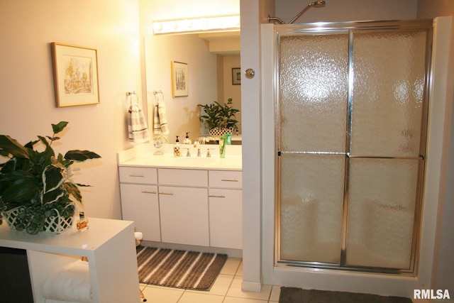 4011 Prairie Ln, Bettendorf, IA 52722 - full bath with vanity, a stall shower, and tile patterned floors