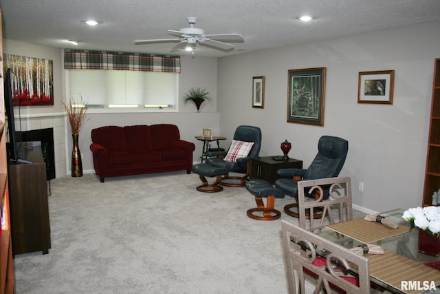 4011 Prairie Ln, Bettendorf, IA 52722 - living room featuring ceiling fan, carpet floors, recessed lighting, a textured ceiling, and baseboards