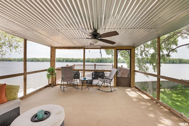 905 1st St, Camanche, IA 52730 - sunroom / solarium featuring ceiling fan and a water view