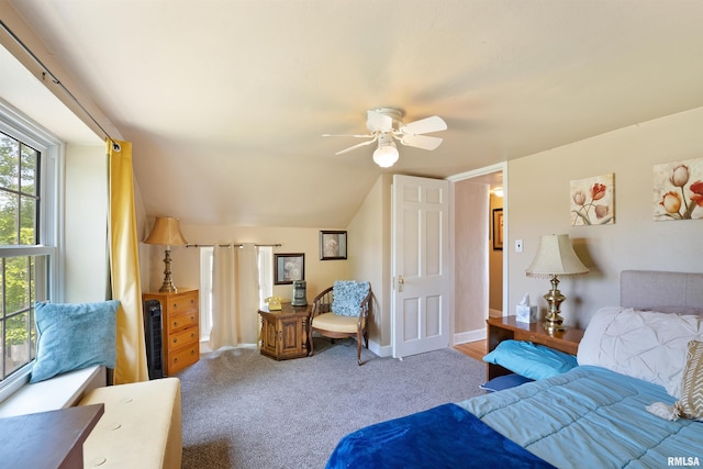 905 1st St, Camanche, IA 52730 - bedroom featuring carpet floors, a ceiling fan, baseboards, and vaulted ceiling