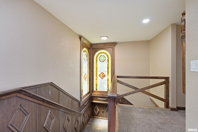 905 1st St, Camanche, IA 52730 - staircase featuring carpet floors, a textured wall, recessed lighting, and baseboards