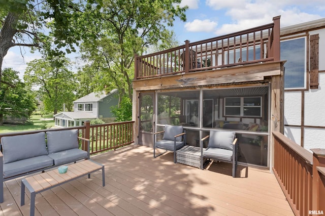 905 1st St, Camanche, IA 52730 - deck with a sunroom and an outdoor hangout area