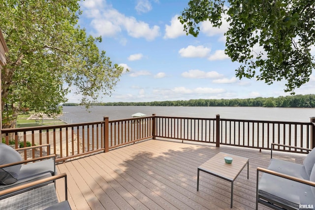 905 1st St, Camanche, IA 52730 - wooden terrace with a water view