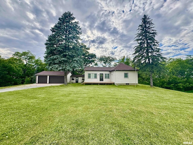 1492 45th St, New Boston, IL 61272 - view of front of house featuring an outdoor structure, driveway, a front lawn, a deck, and view of wooded area