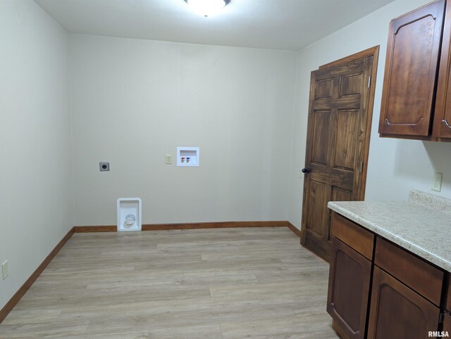 1492 45th St, New Boston, IL 61272 - laundry area with electric dryer hookup, hookup for a washing machine, light wood-style flooring, and baseboards