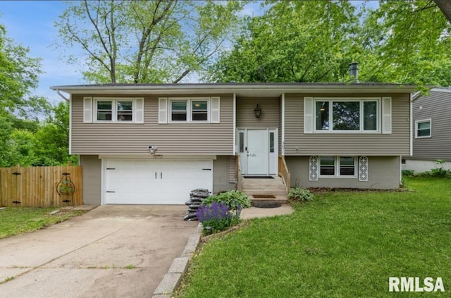 3071 S Hampton Dr, Bettendorf, IA 52722 - bi-level home featuring an attached garage and driveway