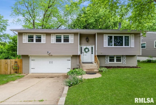 3071 S Hampton Dr, Bettendorf, IA 52722 - split foyer home with an attached garage and concrete driveway