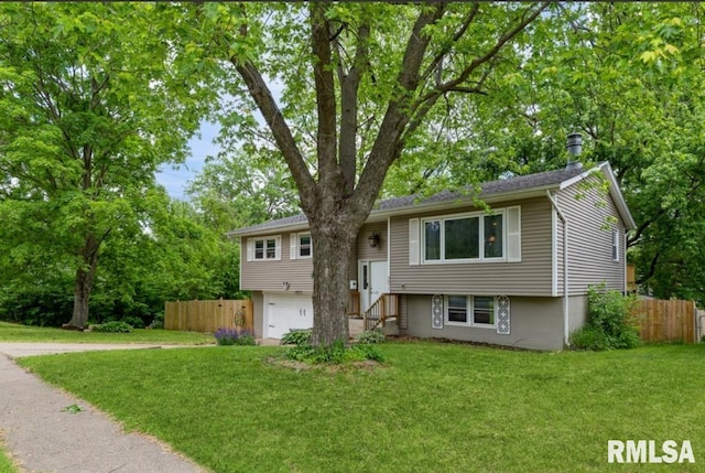 3071 S Hampton Dr, Bettendorf, IA 52722 - raised ranch with a garage and view of scattered trees