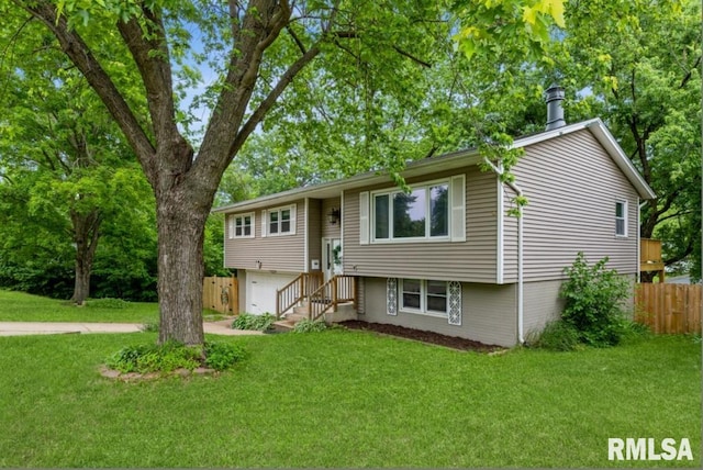 3071 S Hampton Dr, Bettendorf, IA 52722 - split foyer home with a garage and driveway
