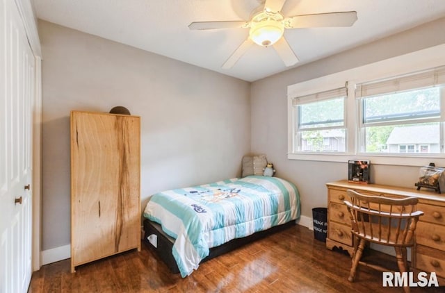 3071 S Hampton Dr, Bettendorf, IA 52722 - bedroom featuring baseboards, wood finished floors, and ceiling fan