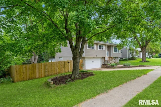 3071 S Hampton Dr, Bettendorf, IA 52722 - bi-level home with a garage and driveway