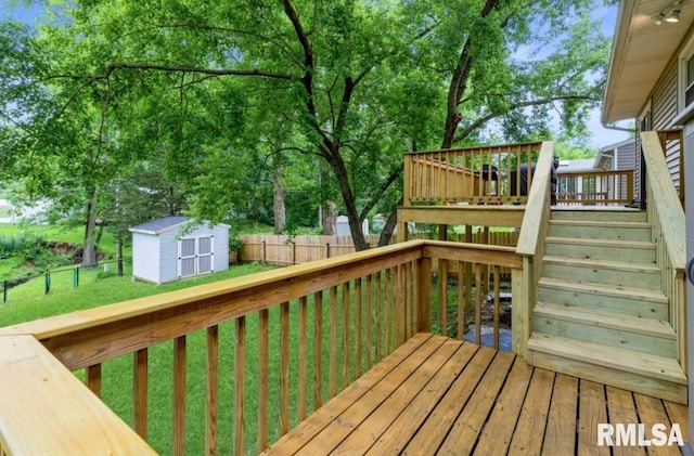 3071 S Hampton Dr, Bettendorf, IA 52722 - deck featuring a storage unit, a fenced backyard, and stairway