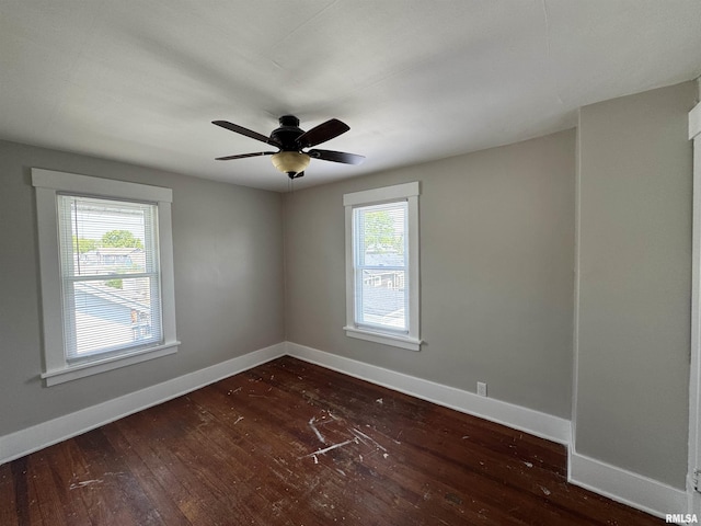 1122 E Colorado St, Davenport, IA 52803 - spare room featuring hardwood / wood-style floors, baseboards, and a ceiling fan
