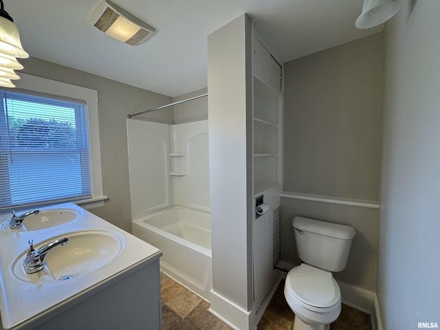 1122 E Colorado St, Davenport, IA 52803 - bathroom featuring tub / shower combination, toilet, and double vanity