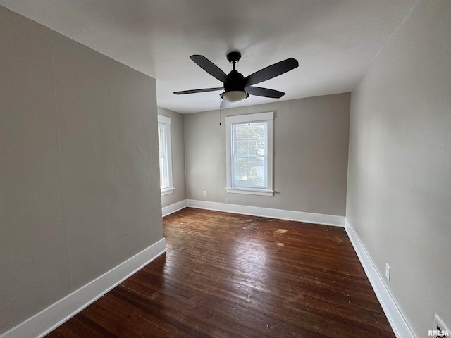 1122 E Colorado St, Davenport, IA 52803 - spare room featuring wood finished floors, baseboards, and ceiling fan