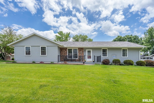 1415 W 59th St, Davenport, IA 52806 - ranch-style home featuring a front lawn