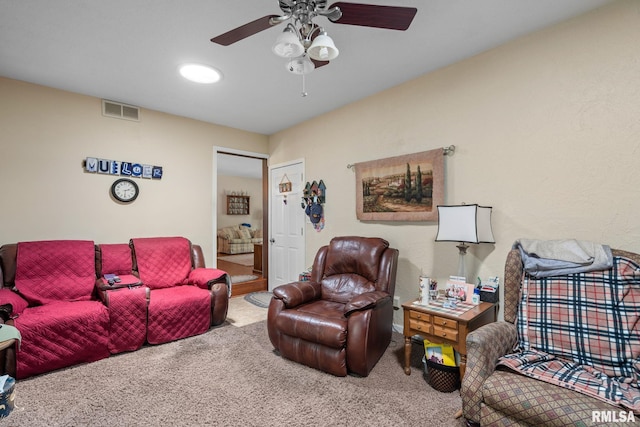 1415 W 59th St, Davenport, IA 52806 - living room featuring carpet floors and ceiling fan