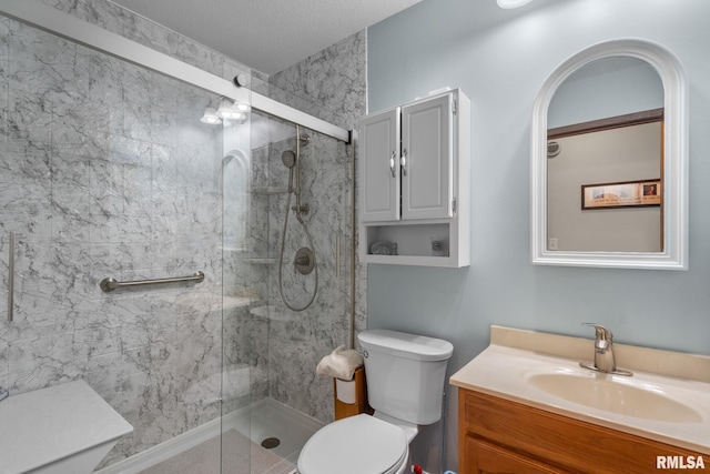 1415 W 59th St, Davenport, IA 52806 - bathroom featuring a shower stall, vanity, toilet, and a textured ceiling