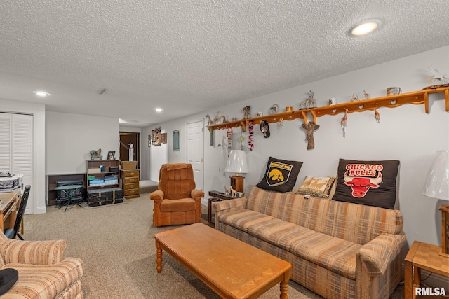 1415 W 59th St, Davenport, IA 52806 - living room with a textured ceiling, recessed lighting, and light carpet