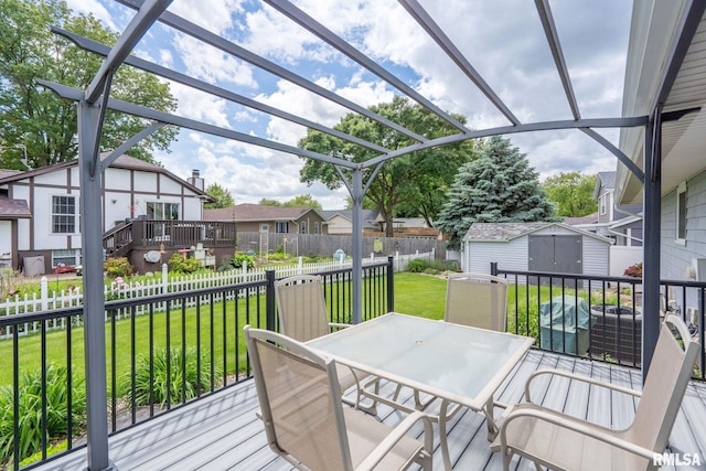 1415 W 59th St, Davenport, IA 52806 - deck featuring a residential view, outdoor dining area, and a pergola