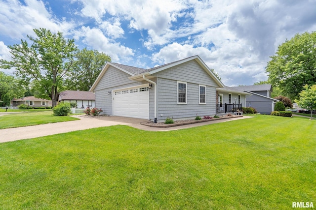 1415 W 59th St, Davenport, IA 52806 - view of front of home with driveway, a garage, and a front lawn
