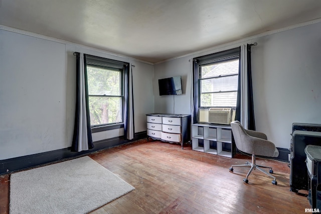 627 5th Ave S, Clinton, IA 52732 - office featuring plenty of natural light, wood-type flooring, crown molding, and baseboards
