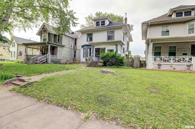 627 5th Ave S, Clinton, IA 52732 - american foursquare style home with a porch