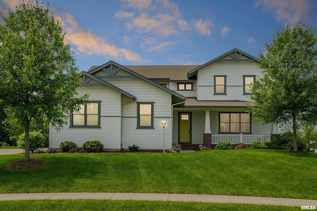 4691 Hidden Lake Ct, Bettendorf, IA 52722 - craftsman inspired home with a porch, a yard, and a shingled roof