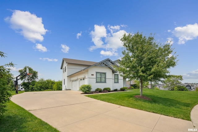 4691 Hidden Lake Ct, Bettendorf, IA 52722 - view of front of house with a front yard, an attached garage, and concrete driveway