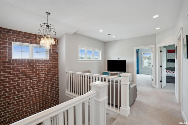4691 Hidden Lake Ct, Bettendorf, IA 52722 - hall featuring an upstairs landing, recessed lighting, and light carpet
