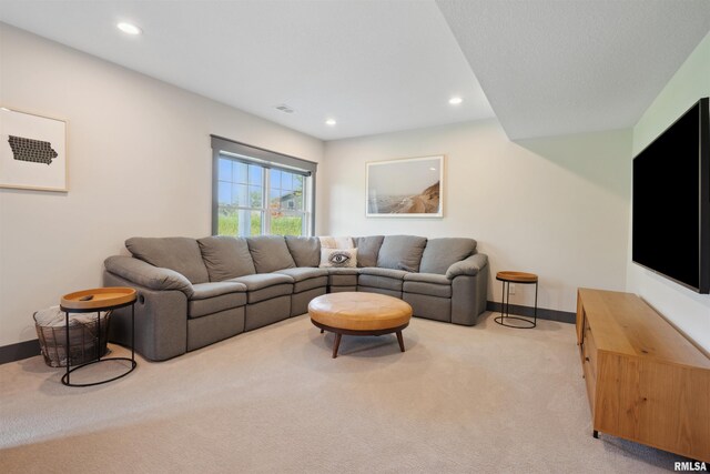 4691 Hidden Lake Ct, Bettendorf, IA 52722 - living area with light colored carpet, recessed lighting, and baseboards