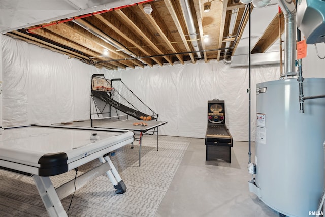 4691 Hidden Lake Ct, Bettendorf, IA 52722 - playroom featuring water heater and finished concrete flooring