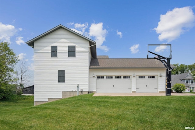 4691 Hidden Lake Ct, Bettendorf, IA 52722 - view of property exterior featuring a lawn and an attached garage