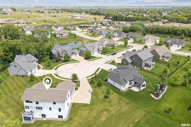 4691 Hidden Lake Ct, Bettendorf, IA 52722 - aerial view of property and surrounding area featuring a nearby body of water and nearby suburban area