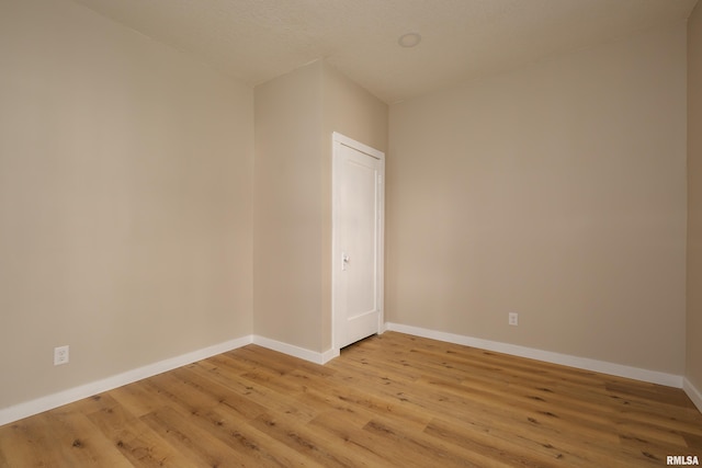 1522 Bridge Ave, Davenport, IA 52803 - unfurnished room featuring light wood-style flooring and baseboards
