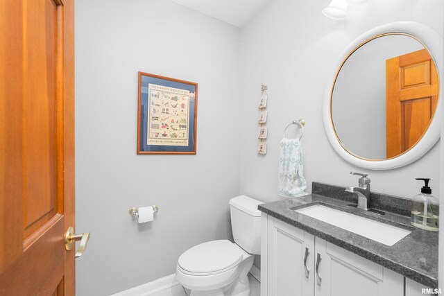 3513 33rd Street Ct, Moline, IL 61265 - bathroom featuring vanity, toilet, and baseboards