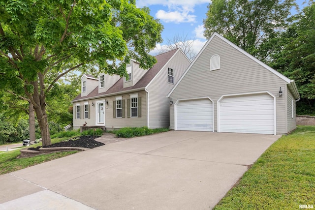3513 33rd Street Ct, Moline, IL 61265 - cape cod house with driveway, a garage, and a shingled roof