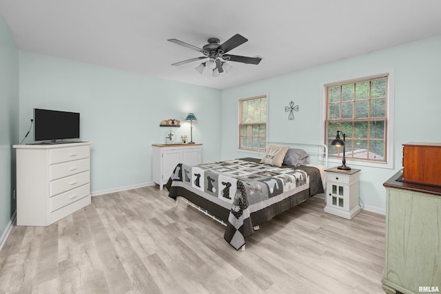 3513 33rd Street Ct, Moline, IL 61265 - bedroom featuring light wood-style floors, baseboards, and ceiling fan