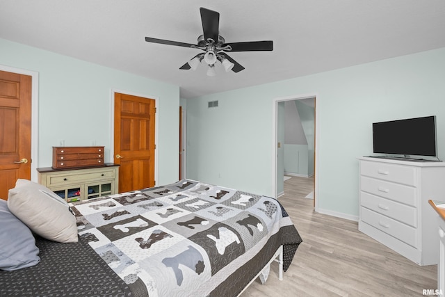 3513 33rd Street Ct, Moline, IL 61265 - bedroom with light wood finished floors, ceiling fan, and baseboards