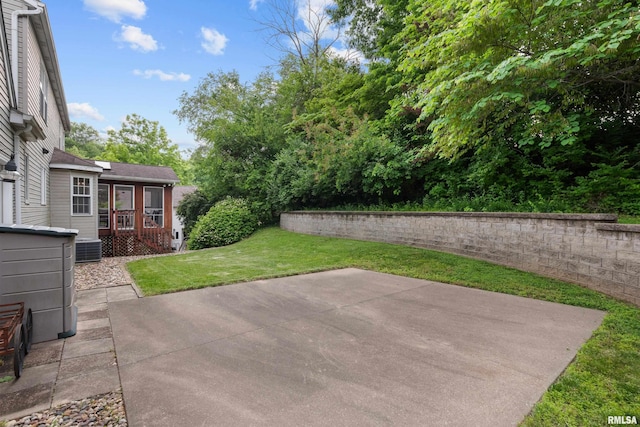 3513 33rd Street Ct, Moline, IL 61265 - view of green lawn featuring a patio area, central AC, and a wooden deck